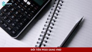 Sổ ghi chép, máy tính và bút để tính số tiền thực nhận