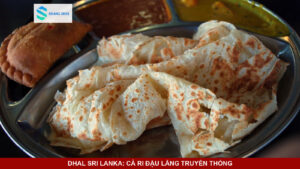 Bát cà ri đậu lăng dhal Sri Lanka vàng óng ăn kèm bánh mì roti.